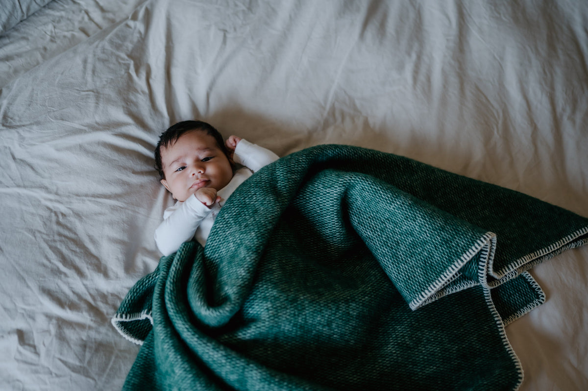 Wollen babydeken groen
