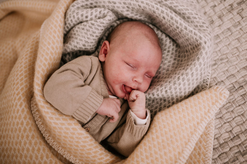 wollen babydeken geel